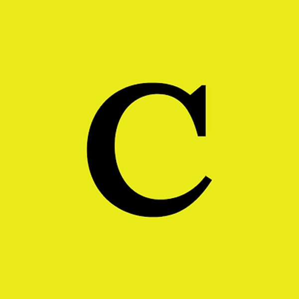 A large, bold, black letter "C" is displayed in the center of a bright yellow background.