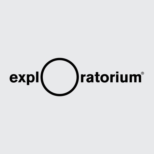 The word "exploratorium" is shown in black lowercase letters with a large black circle replacing the first "o" on a light gray background.